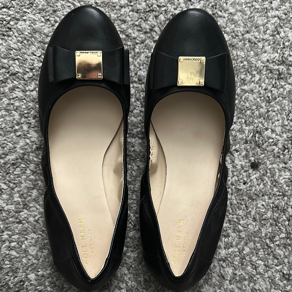 Cole Haan Black Leather Flats with Gold Accents